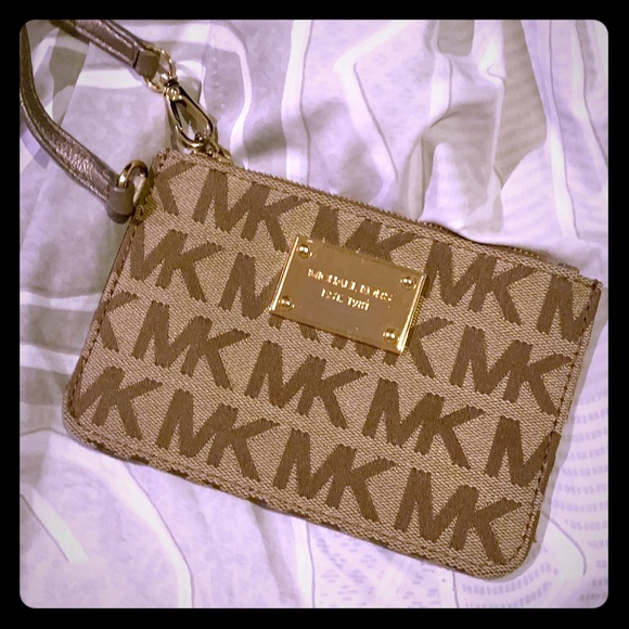 Michael Kors Handbags - MK sig. canvas wristlet w/leather trim, like new